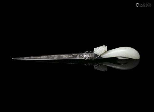 A SILVER LETTER OPENER WITH A JADE HANDLE THE SILVER BLADE: ...