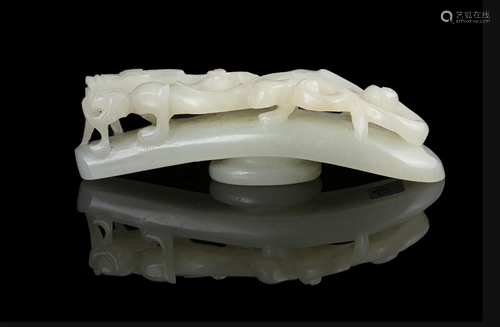 A FRAGMENT OF A WHITE JADE ‘CHI DRAGON’ BELT HOOK / BELT BUC...