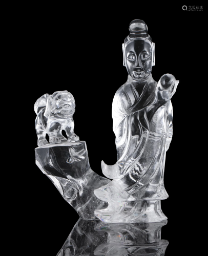 A ROCK CRYSTAL CARVING OF A STANDING LADY WITH A FOO DOG CHI...