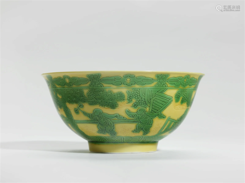 A GREEN AND YELLOW GLAZED INCISED PORCELAIN ‘BOYS’ BOWL CHIN...