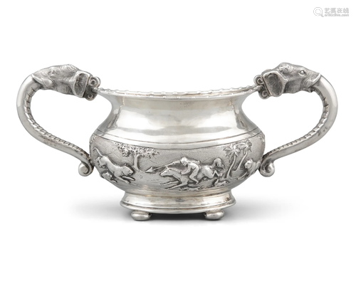 AN ELEPHANT HANDLED AND REPOUSSE ANGLO INDIAN RAJ SILVER ‘HU...