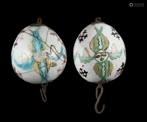 A GROUP OF TWO (2) KUTAHYA CERAMIC EGGS / HANGING ORNAMENTS ...