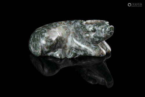 A MOTTLED JADE CARVING OF A RECUMBENT WATER BUFFALO OR OX CH...