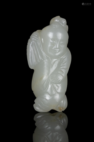 A SMALL WHITE JADE CARVING OF A BOY WITH A LOTUS CHINA, LATE...