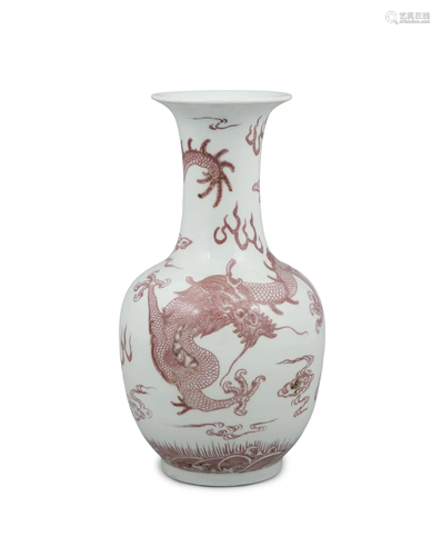 A PUCE-ENAMELLED 'DRAGON' PORCELAIN BOTTLE VASE, T...