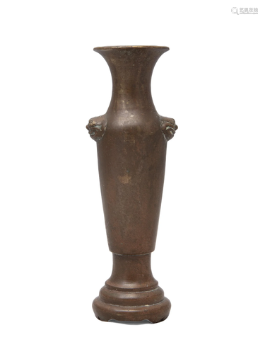 A HEAVY CAST BRONZE SLENDER VASE CHINA, QING DYNASTY It rest...