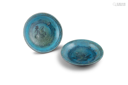 A PAIR OF TURQUOISE AND AUBERGINE GLAZED BISCUIT PORCELAIN C...