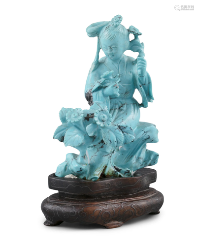 A TURQUOISE MATRIX CARVING OF A LADY SEATED ON ROCKS CHINA, ...