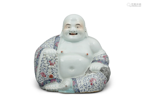 A FAMILLE ROSE PORCELAIN SCULPTURE OF A BUDAI OR MILEFO CHIN...