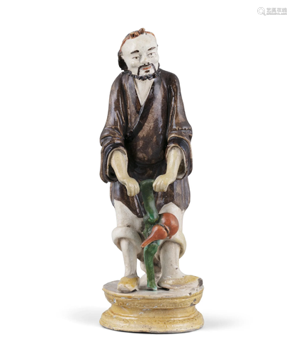 A MOLDED AND ENAMELED BISCUIT PORCELAIN FIGURE OF TIEGUAI LI...