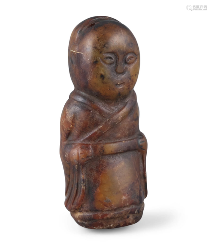 A BROWN SOAPSTONE CARVING OF A STANDING BOY CHINA, SONG STYL...