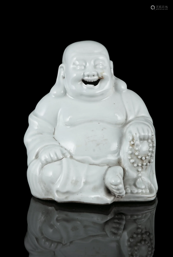 A MOLDED ‘BLANC DE CHINE’ DEHUA PORCELAIN BUDAI OR BUDDHA MA...