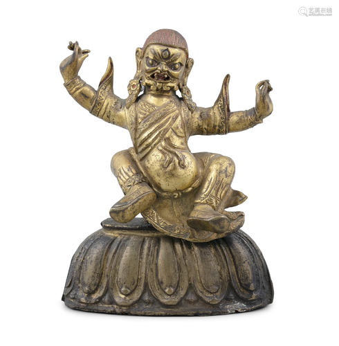 *A GILT BRONZE FIGURE OF A DEITY TIBETO-CHINESE, MODERN H: 1...