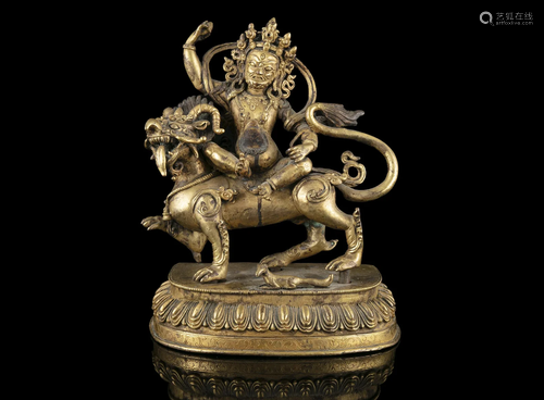 A GILT BRONZE SCULPTURE OF DJAMBALA OR KUBERA TIBETO-CHINESE...