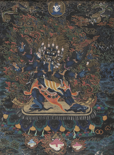 A LARGE BROCADE MOUNTED THANGKA OF A FOUR-ARMED VAJRAKILAYA ...