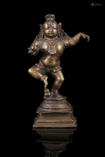 A BRONZE SCULPTURE OF BALAKRISHNA INDIA, POSSIBLY KARNATAKA,...