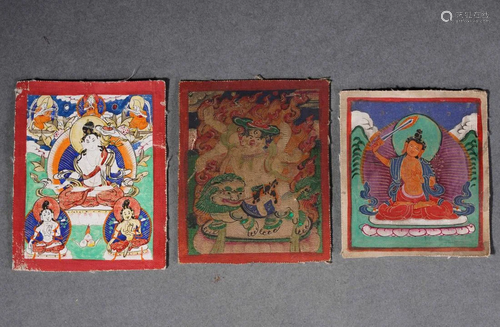 A Group of Three Tibetan Thangka Paintings