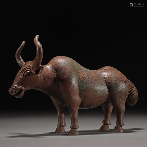 A Chinese Bronze Standing Ox