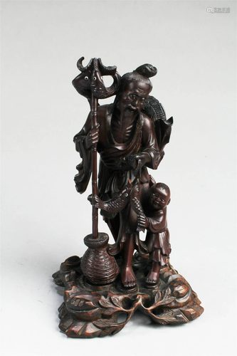 A Carved Wooden Figurine