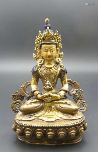 TIBET. BOUDDHA en bronze doré, la tête à r