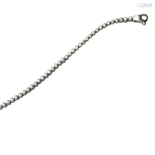 Bracelet rivière de diamants en or gris 18 ct orné de 75 bri...