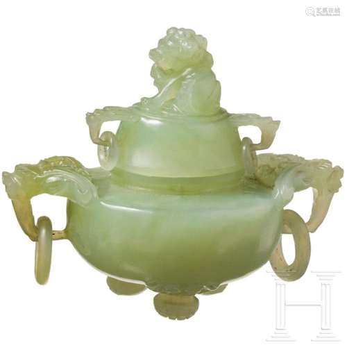 A Chinese lidded vessel in light green jade, late 19th/early...