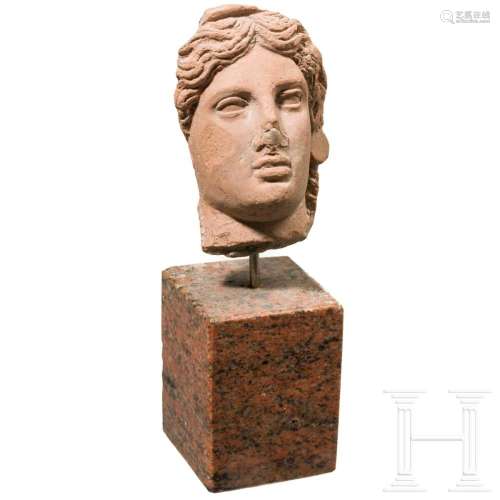 A terracotta head of a woman, 4th century B.C.