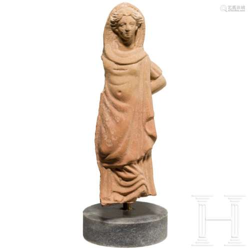 A Hellenistic terracotta of a veiled woman, 3rd - 2nd centur...