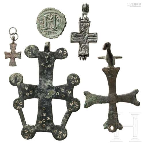Four Byzantine crosses, one enkolpion and a coin (follis Nic...