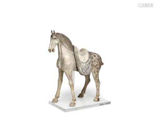 AN ELEGANT PAINTED POTTERY FIGURE OF A HORSE Tang dynasty (2...