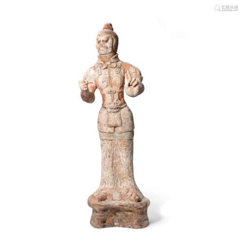 A PAINTED POTTERY FIGURE OF A GUARDIAN Tang dynasty