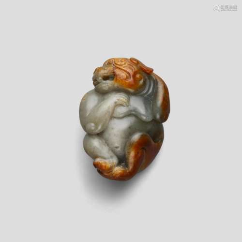 A GRAY AND RUSSET 'MYTHICAL BEAST' PENDANT Qing dynasty