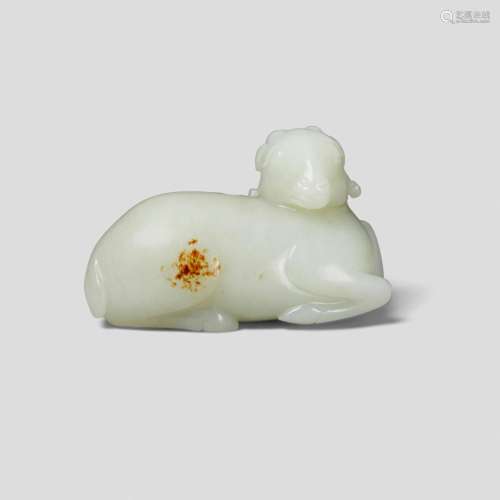 A PALE CELADON JADE CARVING OF A RECUMBENT RAM 19th century
