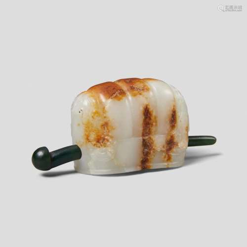 A WHITE AND RUSSET JADE HAIR ORNAMENT  Late Qing dynasty  (2...