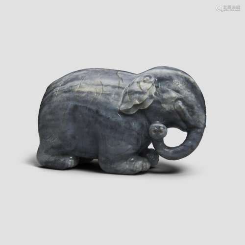 A GRAY JADE FIGURE OF AN ELEPHANT  Late 19th century