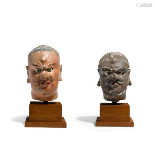 TWO POLYCHROME PAINTED STUCCO HEADS OF LUOHAN Yuan/Ming dyna...