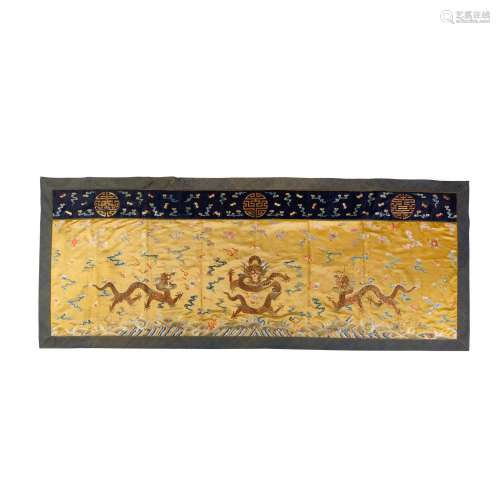 A MASSIVE YELLOW-GROUND EMBROIDERED SILK 'DRAGON' ALTAR FRON...