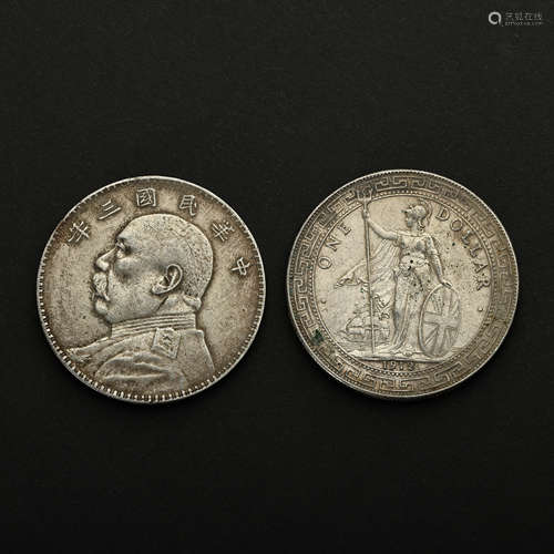 A GROUP OF CHINESE 20TH CENTURY STERLING SILVER COINS