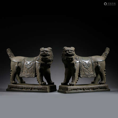 A PAIR OF BLUESTONE LIONS, YUAN DYNASTY, CHINA