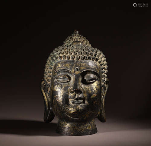 The bronze gilded Sakyamuni Buddha head in the Ming Dynasty