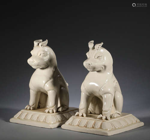 A pair of white porcelain auspicious animals in ancient Chin...