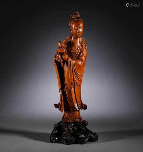 Standing statue of Guanyin in boxwood in the Qing Dynasty