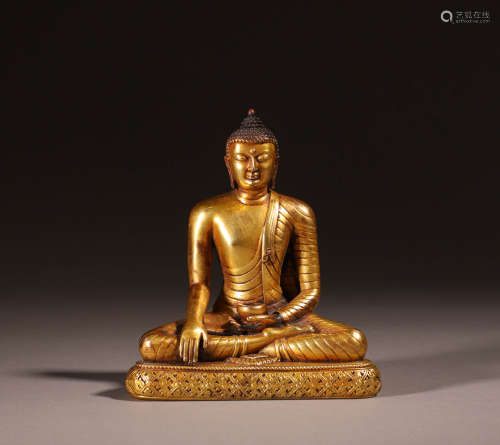 The bronze gilded statue of Sakyamuni in the Qing Dynasty