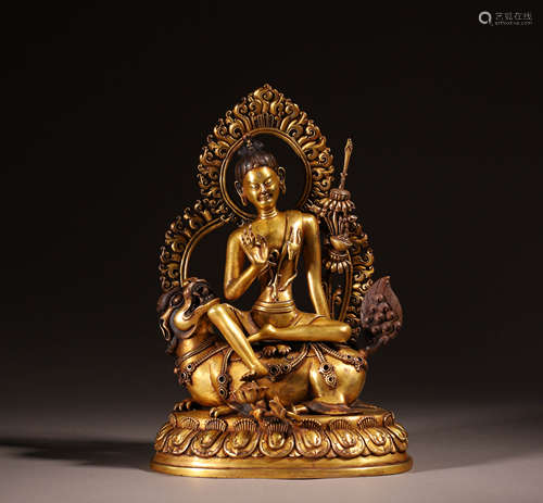 In the Qing Dynasty, bronze gilded statues of seated animals...