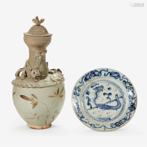 A Chinese iron-brown decorated jar and cover and a blue and ...
