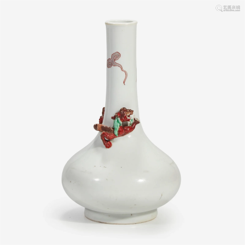A Chinese porcelain bottle vase with applied coiled dragon P...