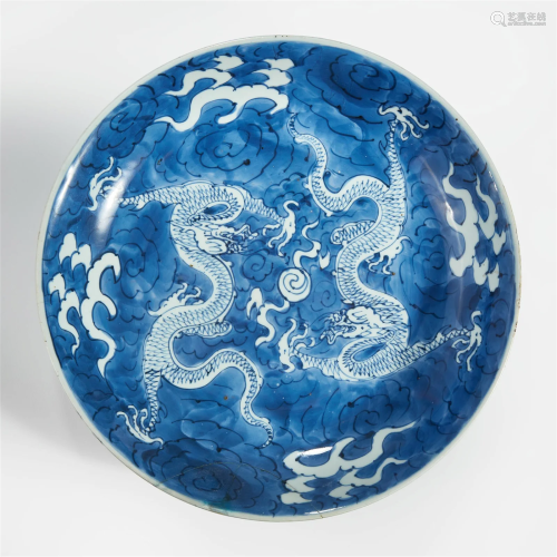 A Chinese blue and white porcelain "Double-Dragon"...