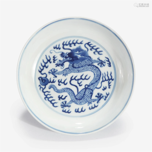 A Chinese blue and white porcelain "Dragon" dish G...