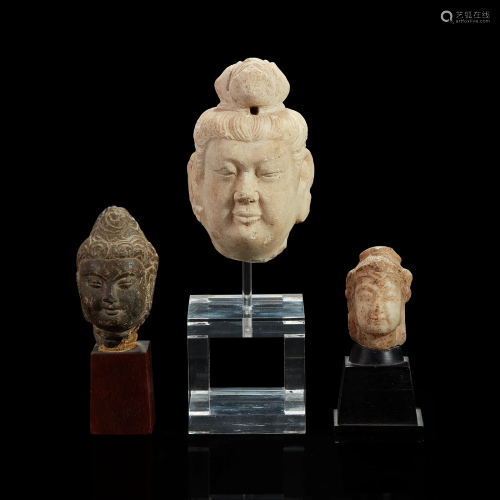 Three Chinese carved stone small heads
