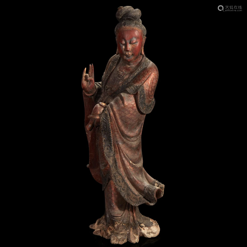 A Chinese carved and lacquered wood figure of Guanyin